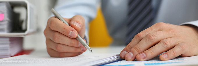 Businessman Working on Figures