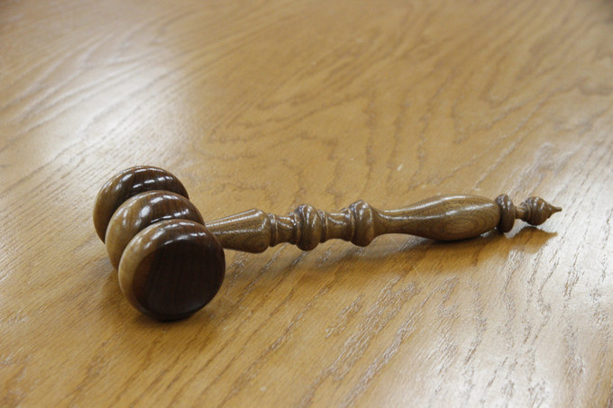 Gavel on Wooden Counter