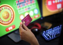 Woman Playing Online Roulette Holding Credit Card
